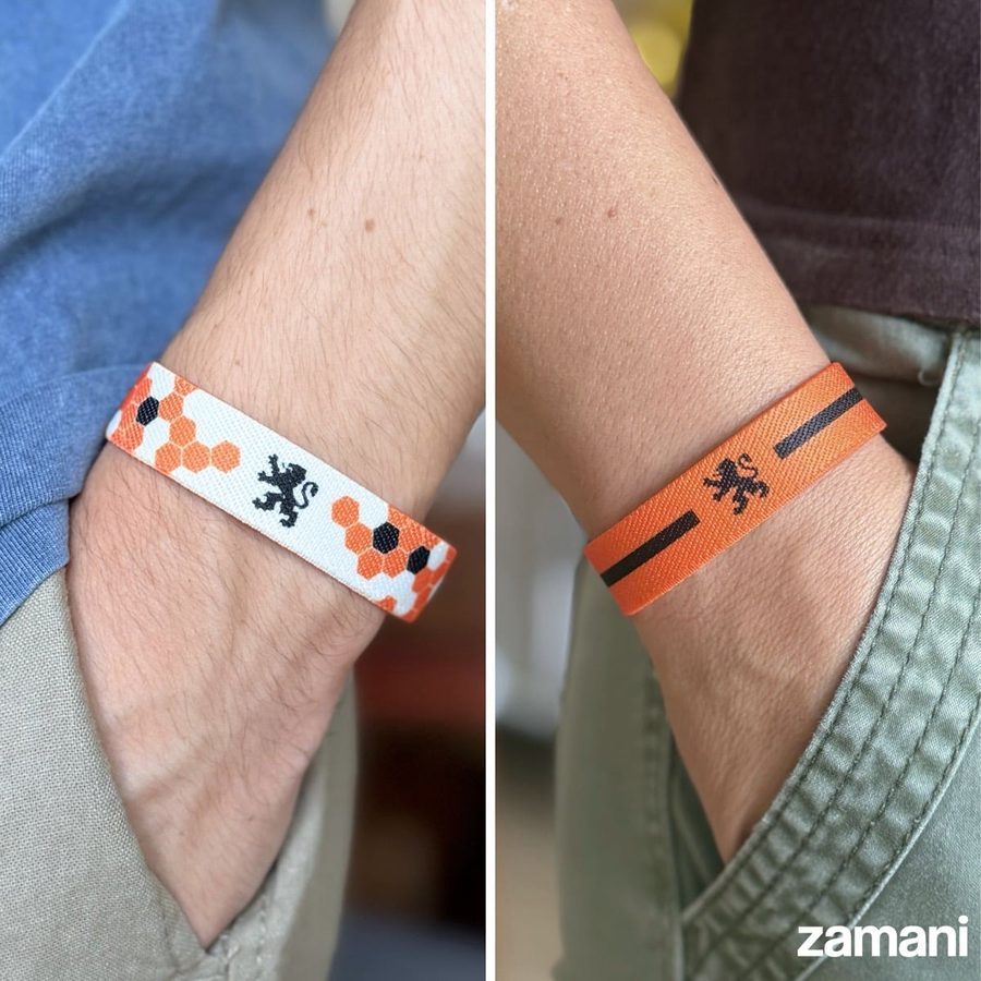 The Netherlands band worn, showing both of its printed faces