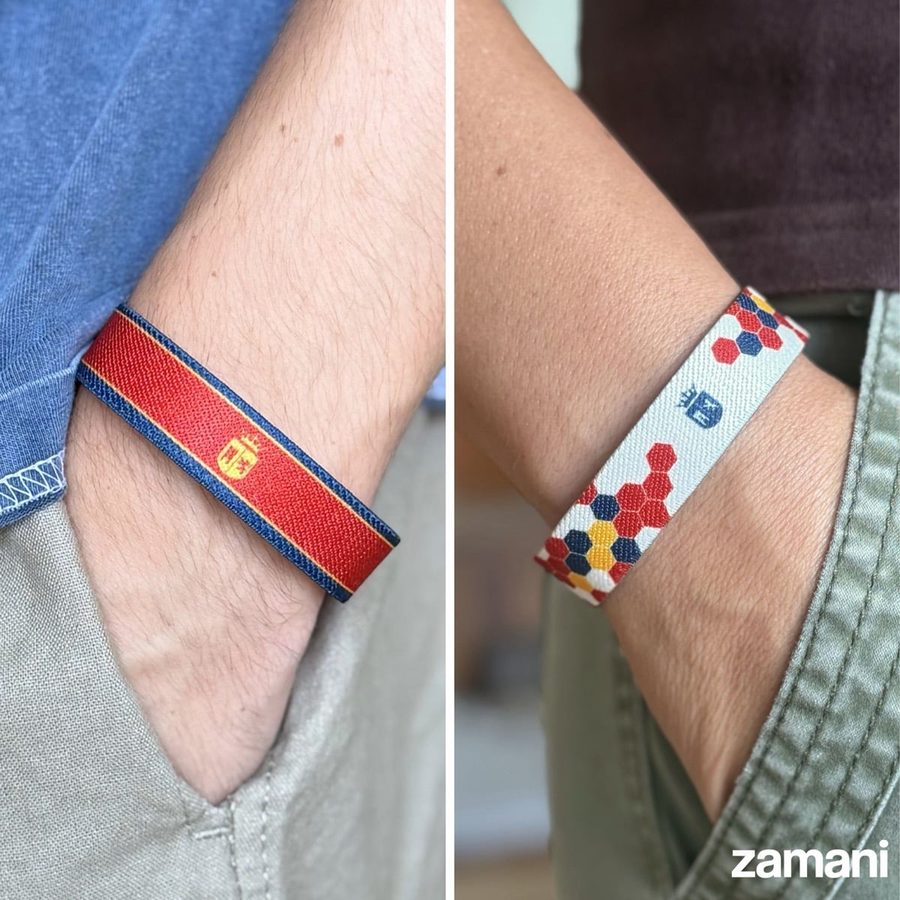 The Spain band worn, showing both of its printed faces